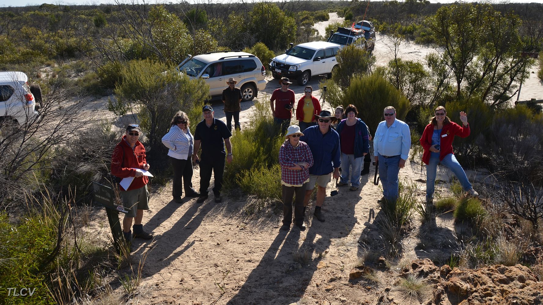 10-Laurie signs the Visitors Book as the rest wait for a photo shoot.JPG